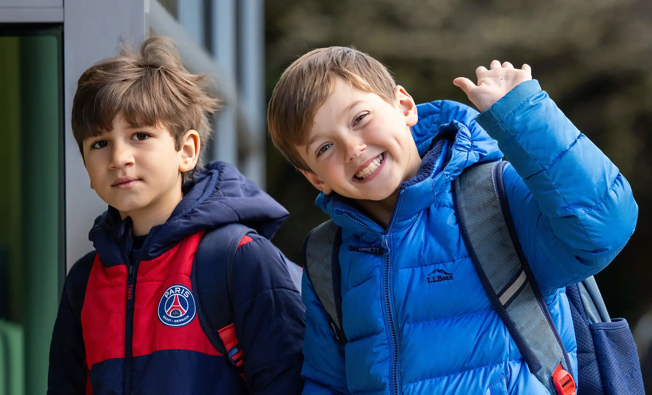 boys walking into a building