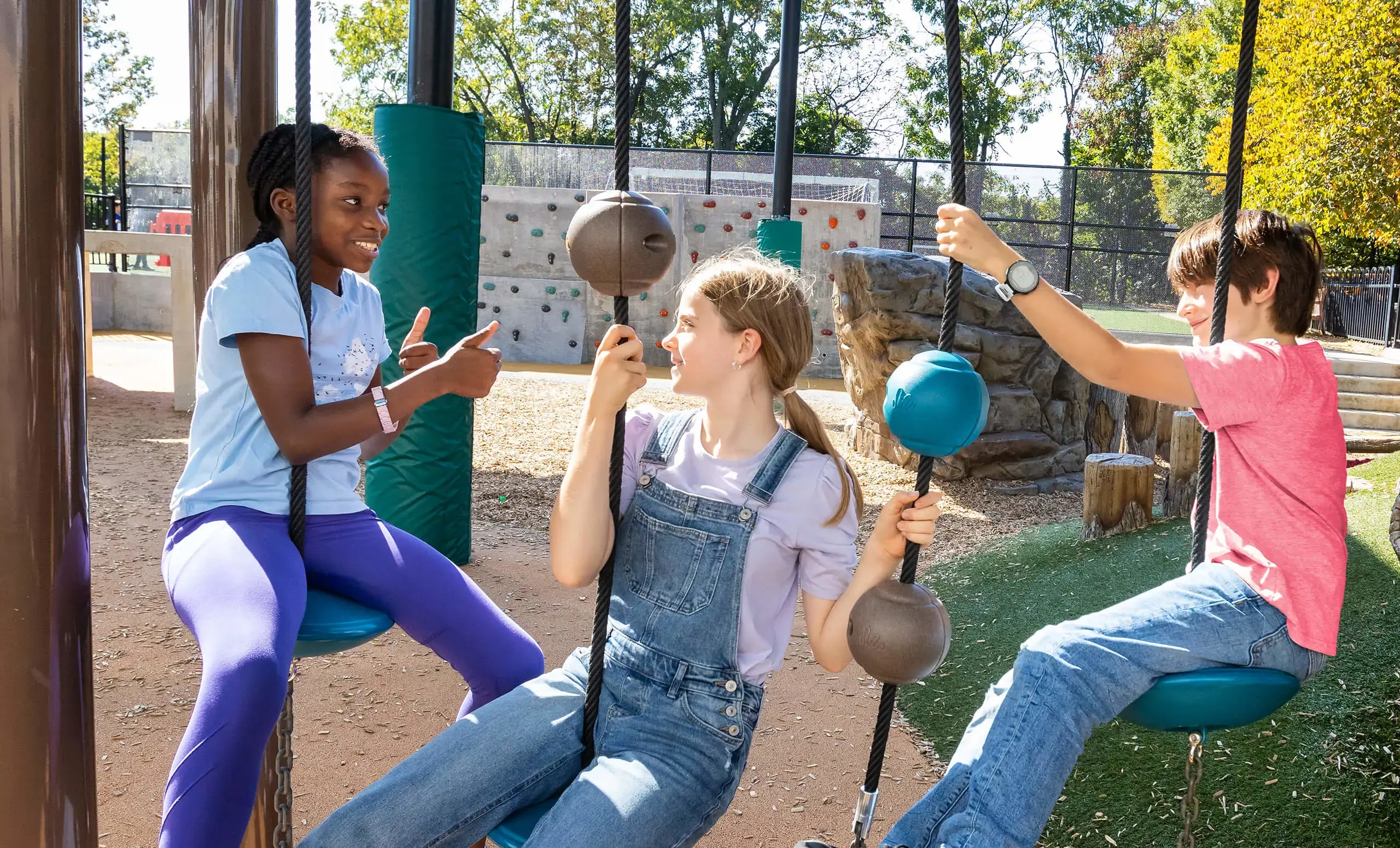 Child playing on playground equipment