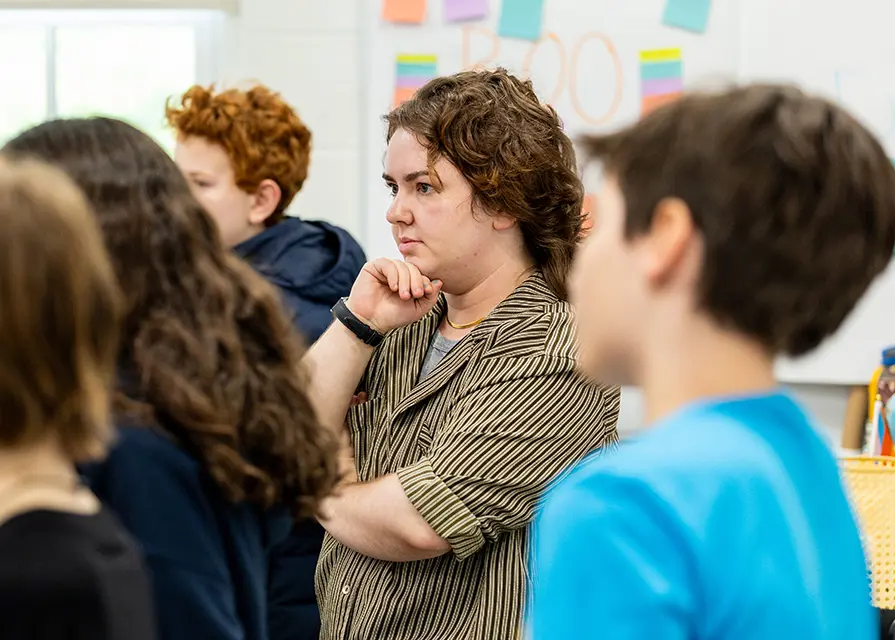 Teacher in a Middle School classroom