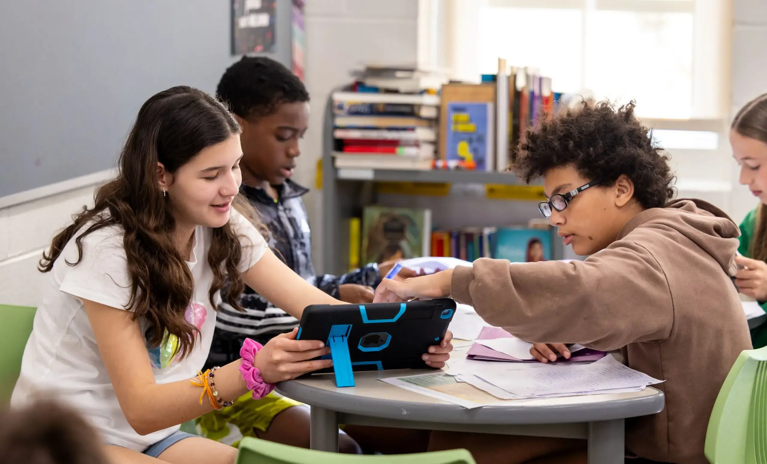 Three children in a classroom