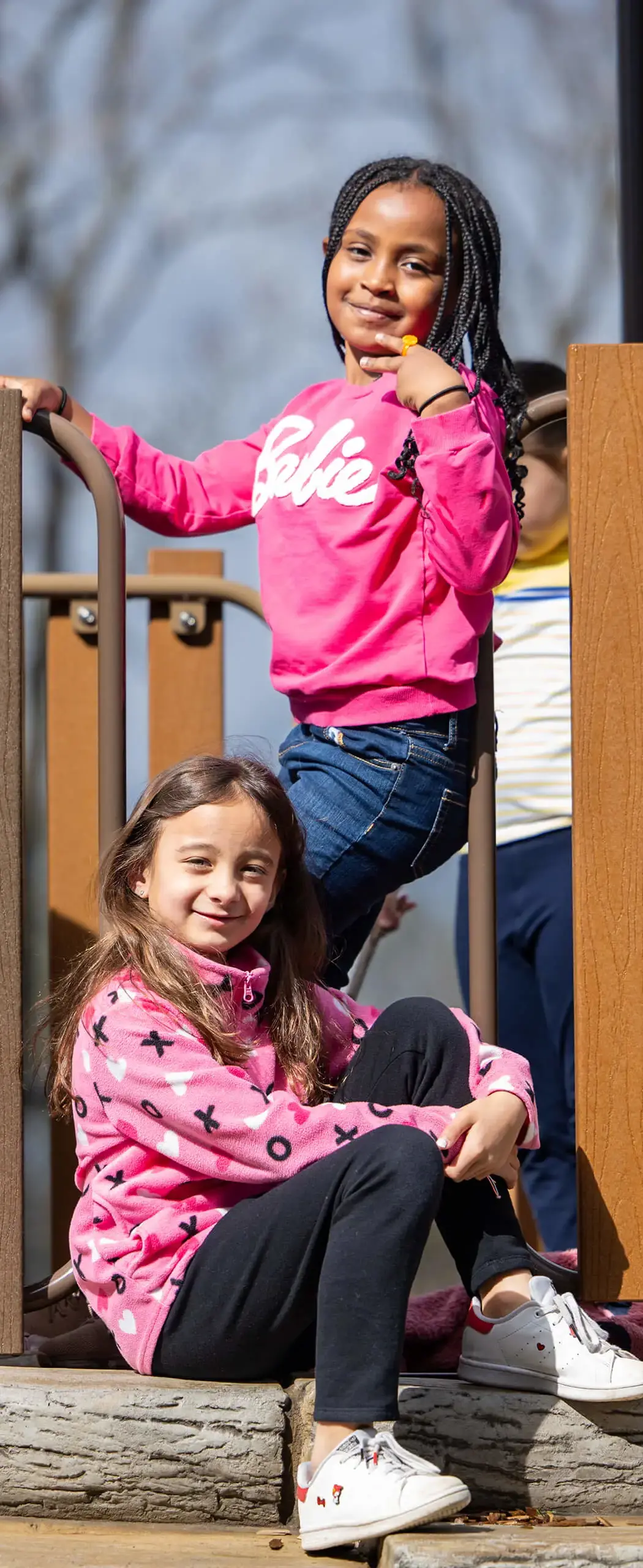 girls posing on the playground