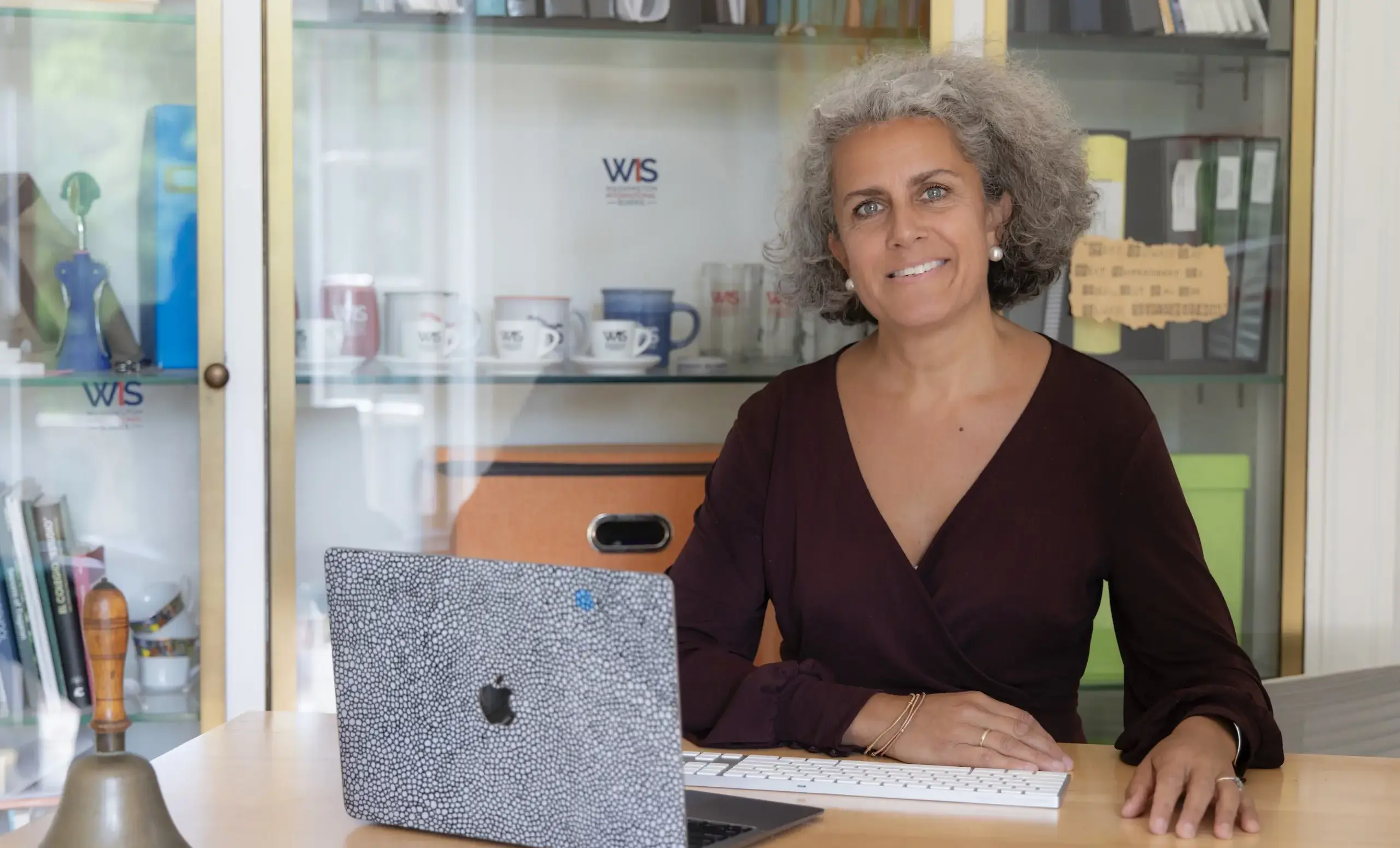 Suzanna at her desk
