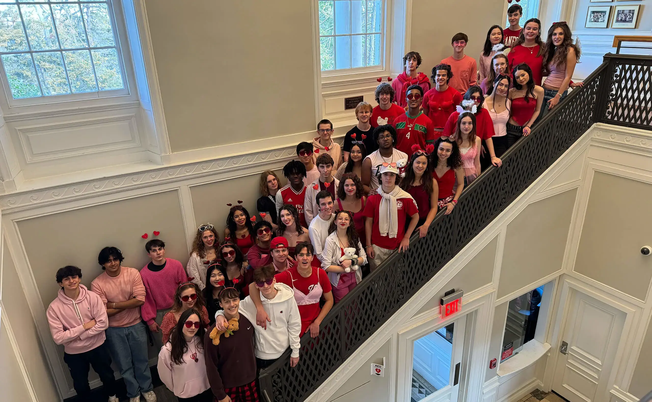 Students on staircase on valentines day