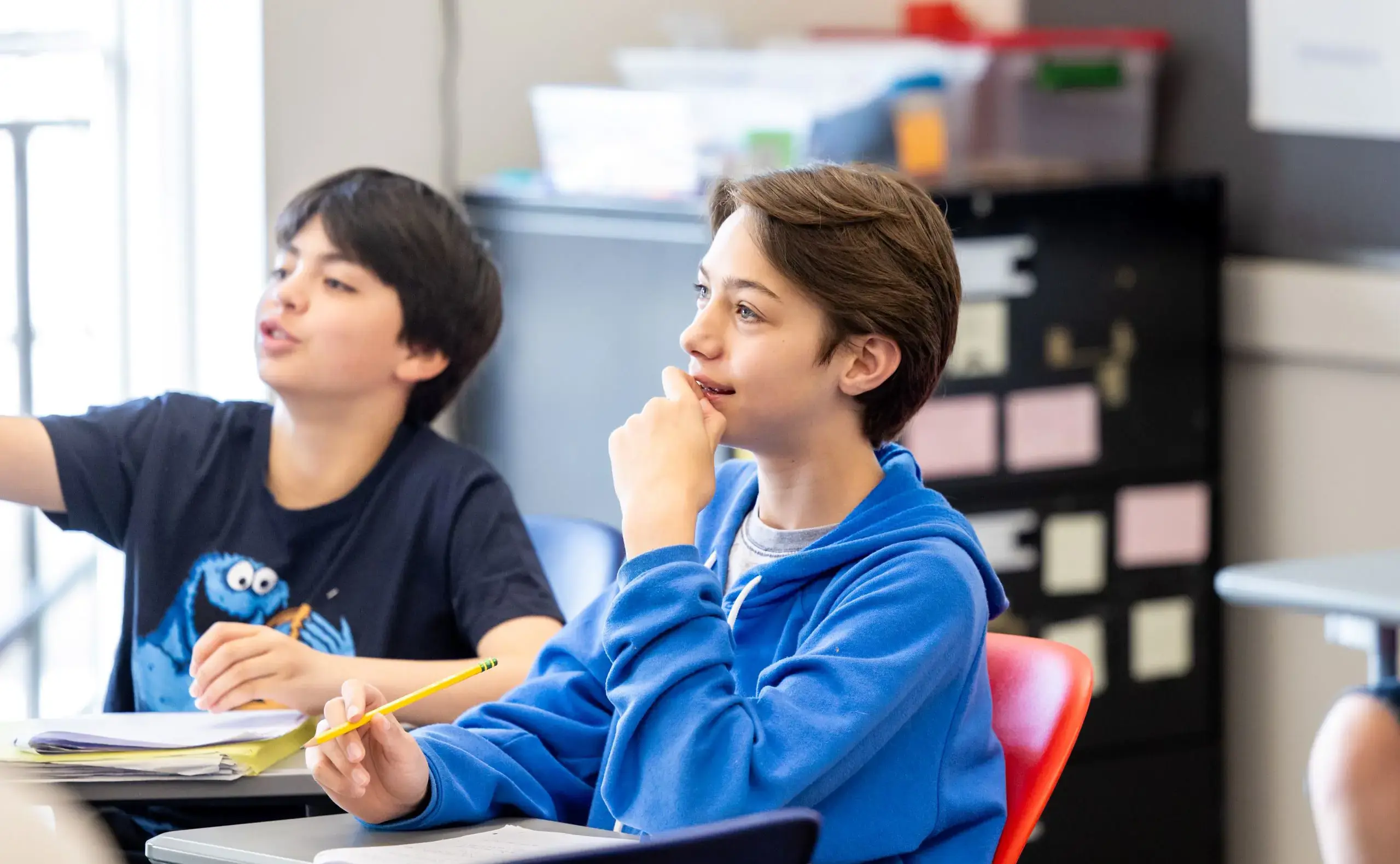 Two students engaged in lesson