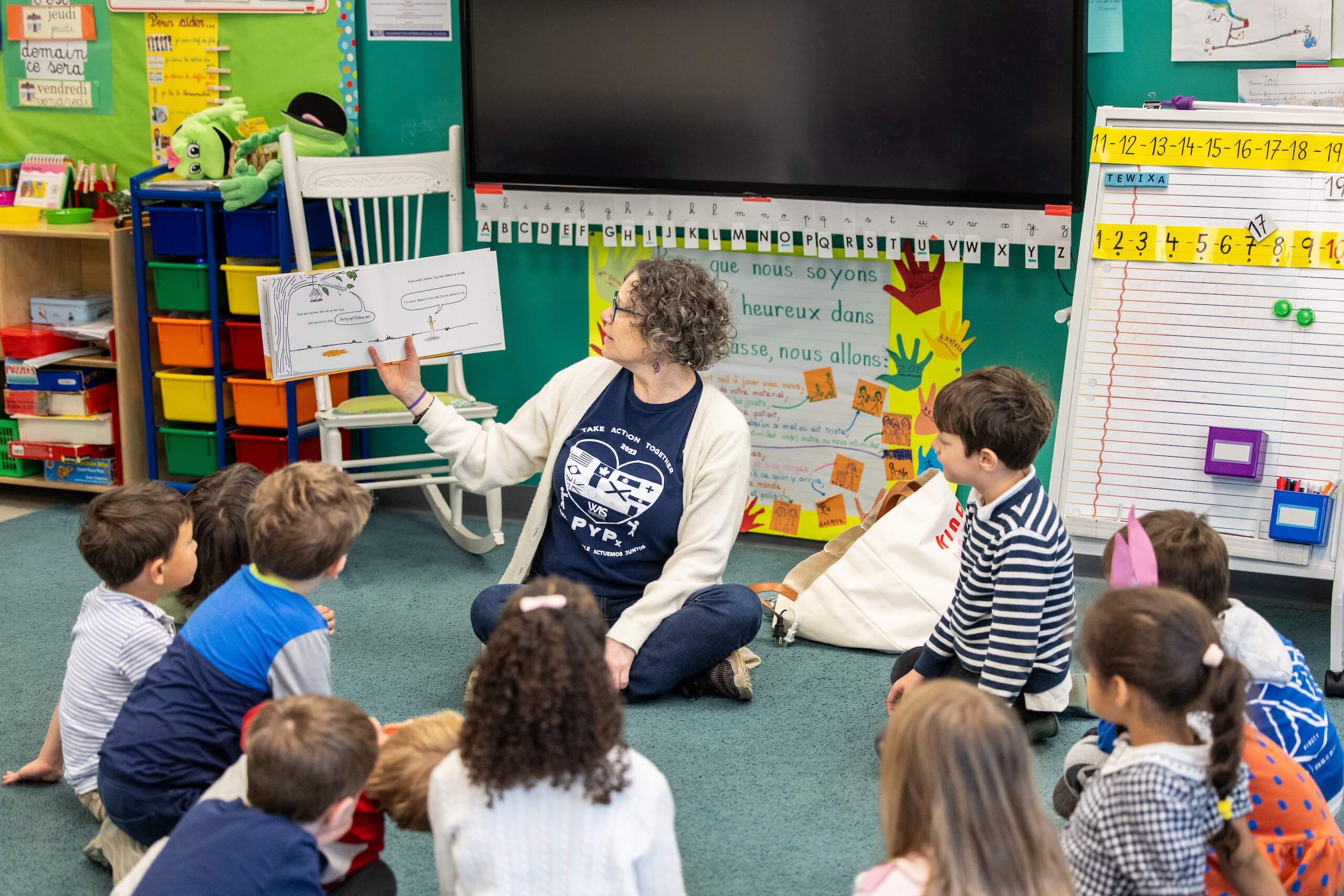 Teacher reading to a class