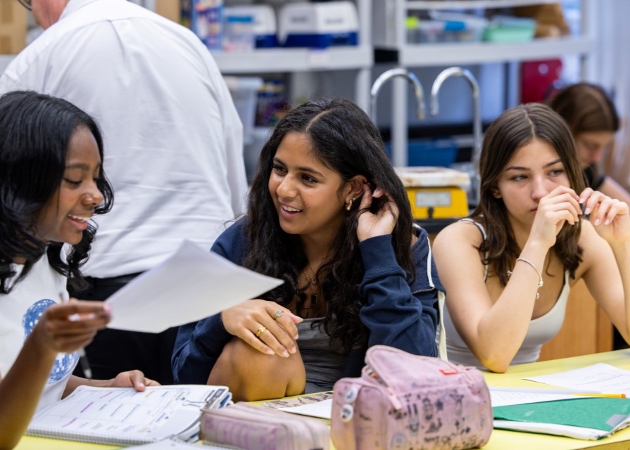 Several girls in a science classroom